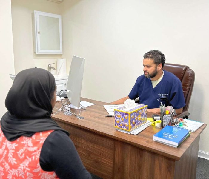 Alam Podiatry with Patient